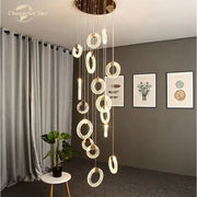 Modern brass bubble crystal led chandelier with circular base and cascading clear faceted glass rings for bedroom decorbites bubble crystal lighting