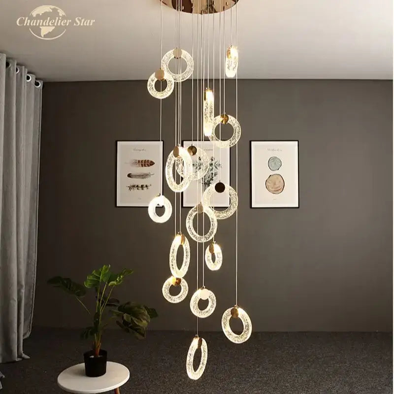 Modern brass bubble crystal led chandelier with gold-toned cascading rings and embedded led lights for bedroom decorbites bubble crystal