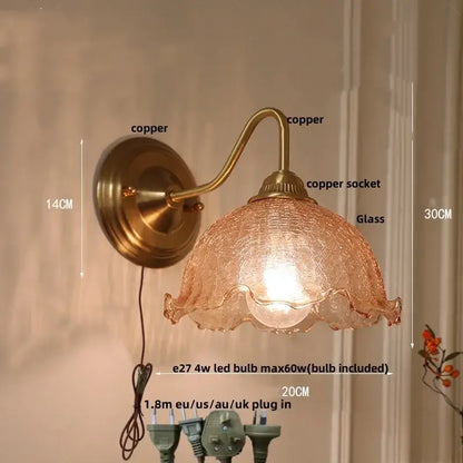 Antique brass copper wall sconce with textured amber-tinted glass shade ideal for decorbites clear glass lighting