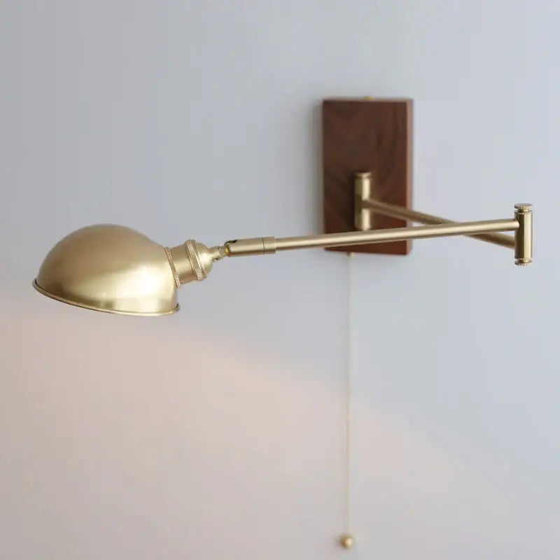 Modern brass canopy led wall light with wooden backplate adjustable arm and pull chain switch for bedroom decorbites canopy led