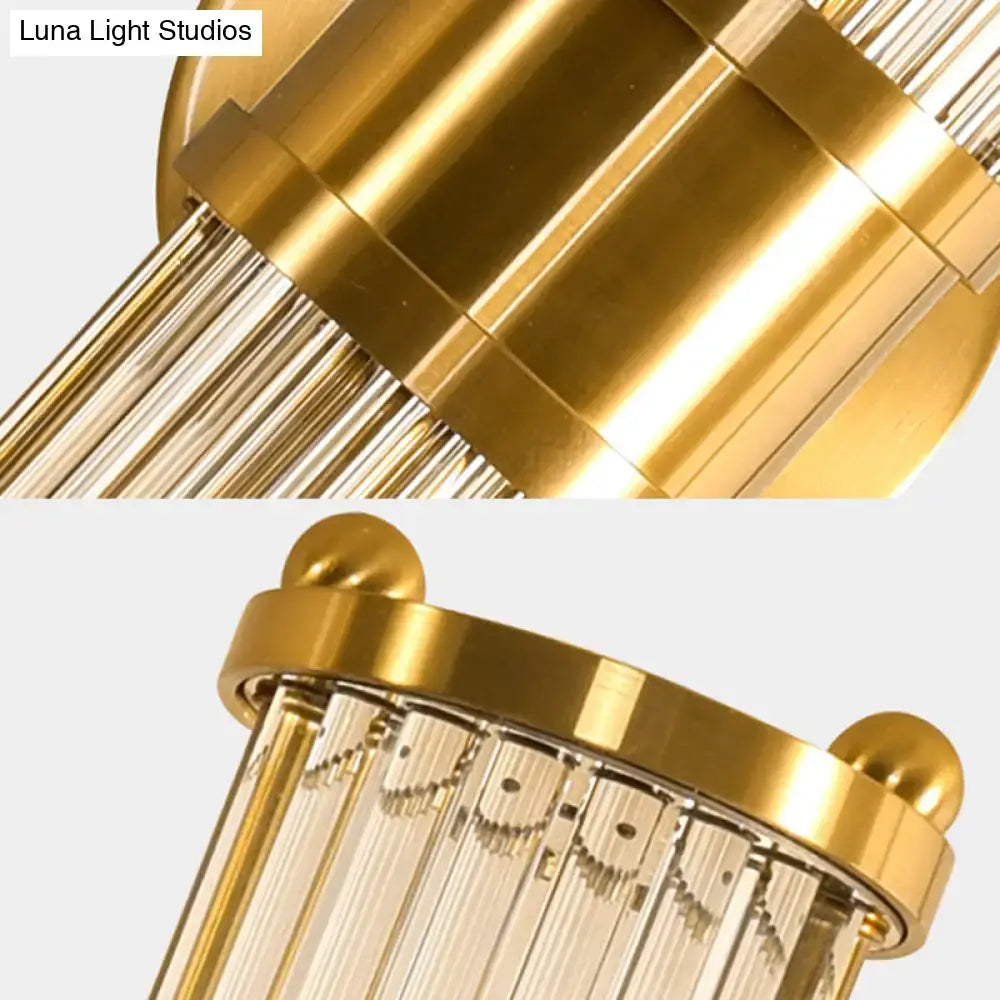 Modern brass clear crystal wall lamp with gold-toned chandelier design and polished brass finish for bedroom sconce