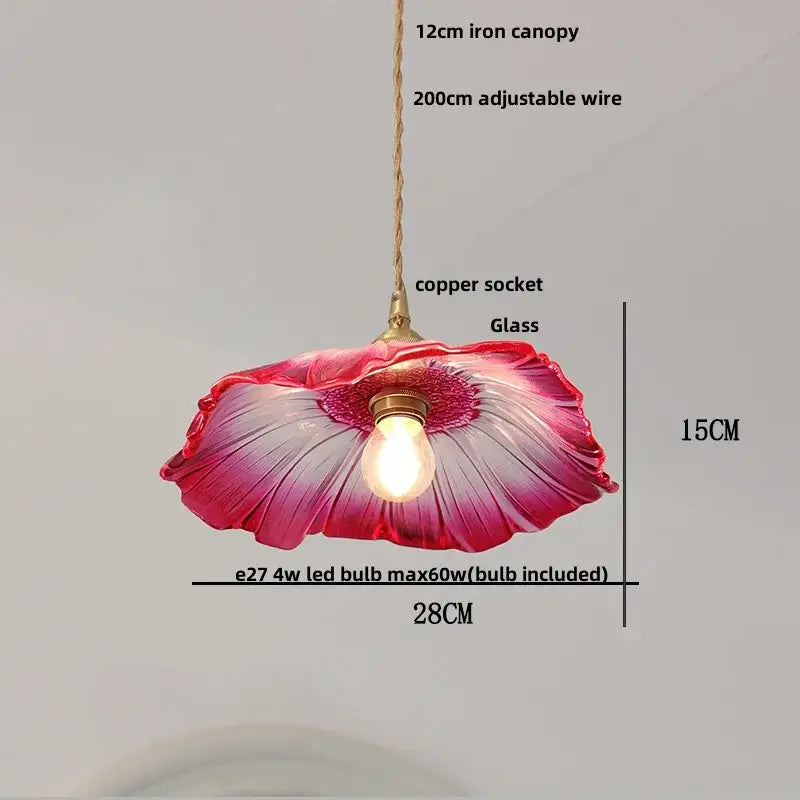 Modern brass clear glass led pendant light featuring a vibrant pink and purple glass flower with copper socket decorbites clear glass