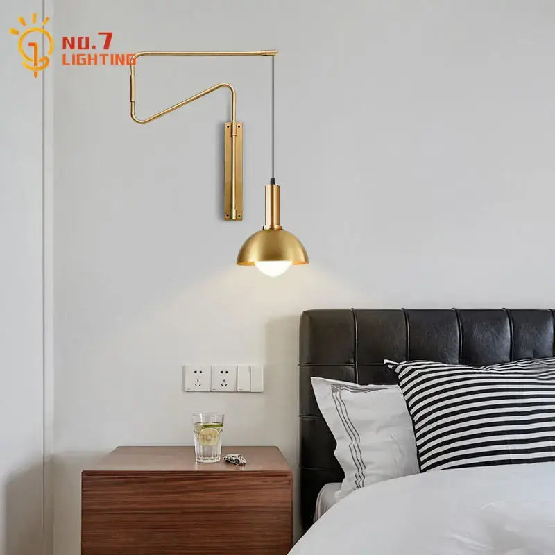 Modern brass copper adjustable wall lamp with gold-colored curved arm and dome shade for living room decorbites copper adjustable