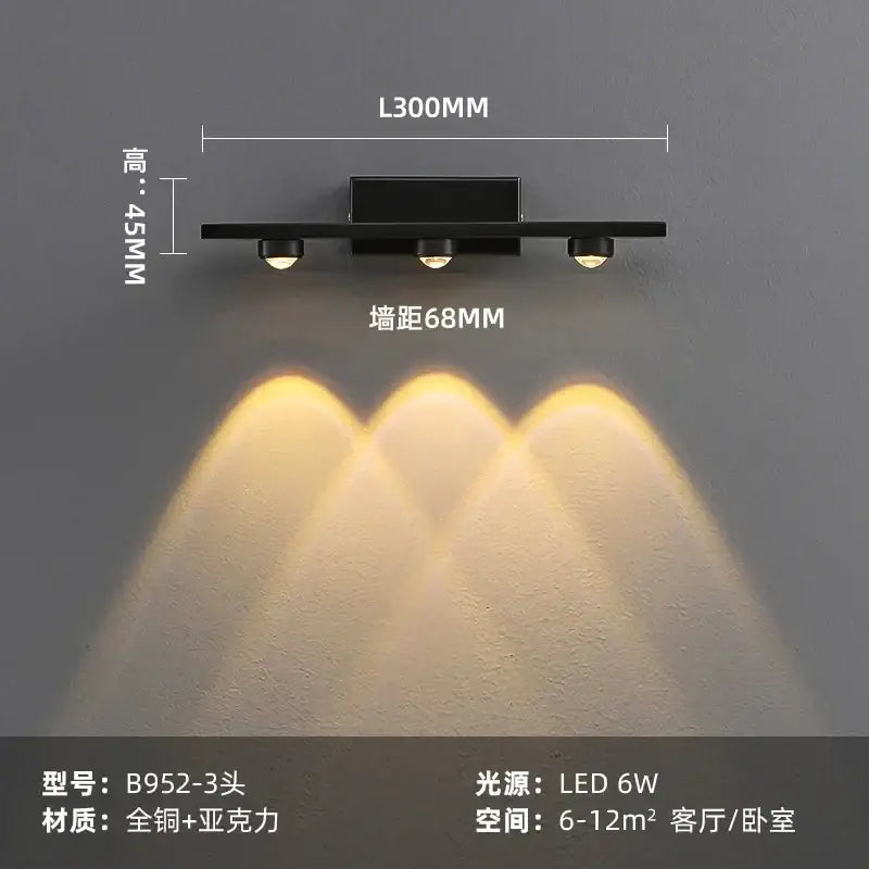 Modern brass copper led wall lamp with black matte finish and three adjustable spotlights for bedroom reading decorbites copper led wall