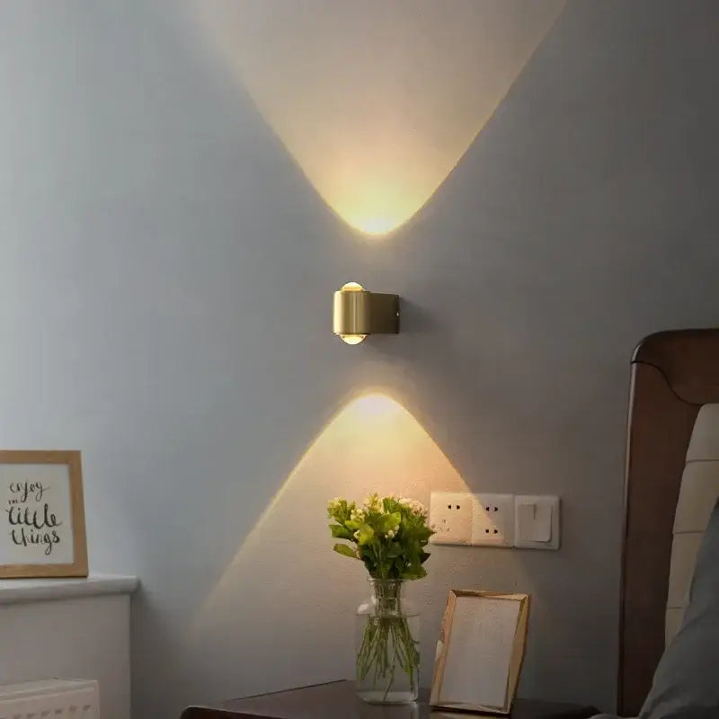 Modern brass copper led wall lamp with gold-toned finish and sleek design casting warm focused light for bedroom reading decorbites copper led