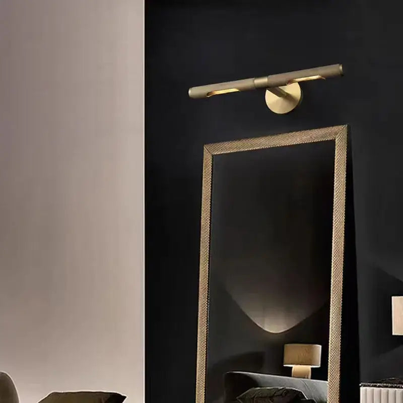 Modern brass copper mirror wall lamp with gold-toned cylindrical design and integrated led bulbs for bedroom decorbites brass copper