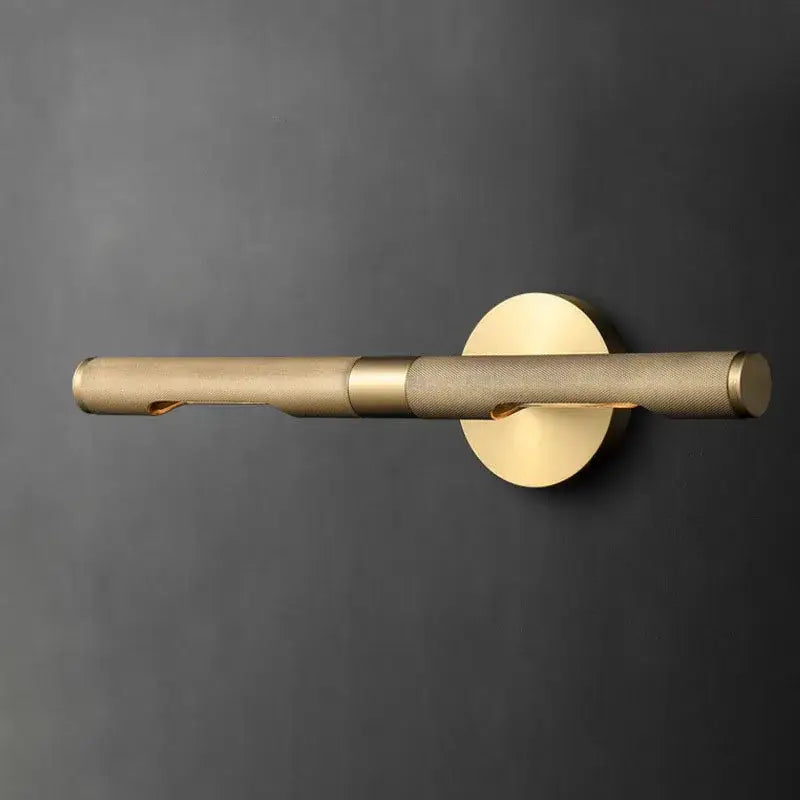 Modern brass copper mirror wall lamp with gold-toned cylindrical bar and textured section for bedroom bathroom decorbites brass copper