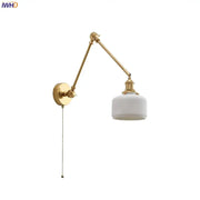 Modern brass copper swing arm wall sconce with white ribbed glass shade and pull-chain switch for bedroom decorbites copper swing