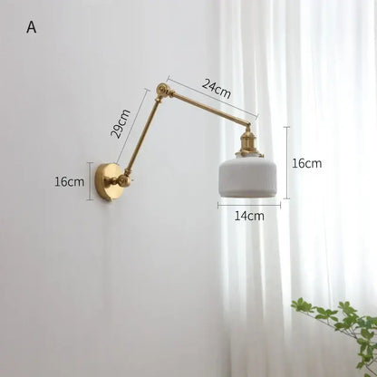 Gold-finished copper swing arm wall sconce with white ribbed ceramic lampshade for modern decorbites copper swing lighting