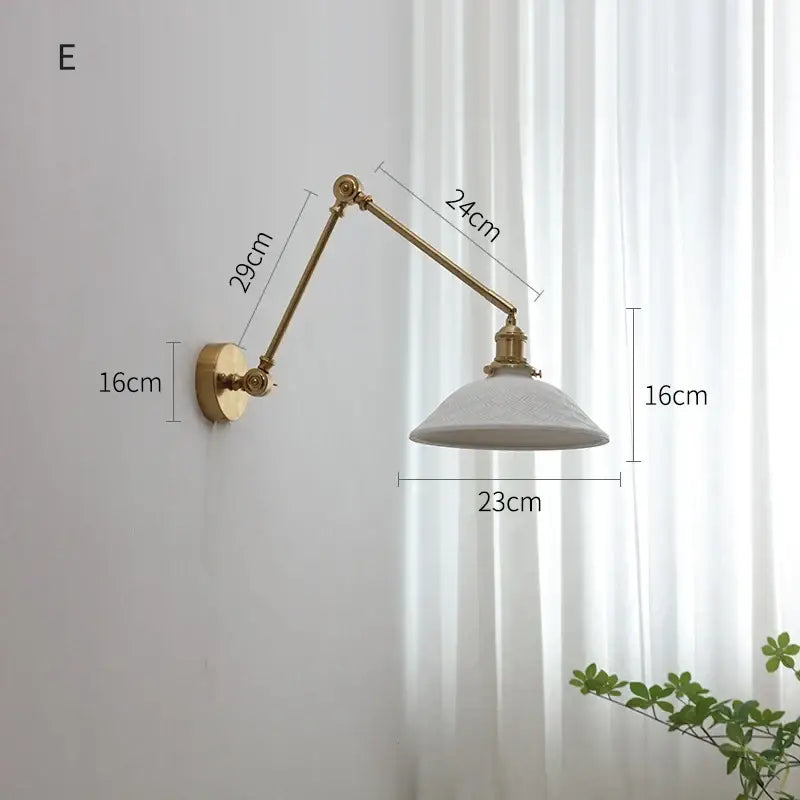 Modern brass copper swing arm wall sconce with gold finish and white textured ribbed glass shade for bedroom decorbites copper swing