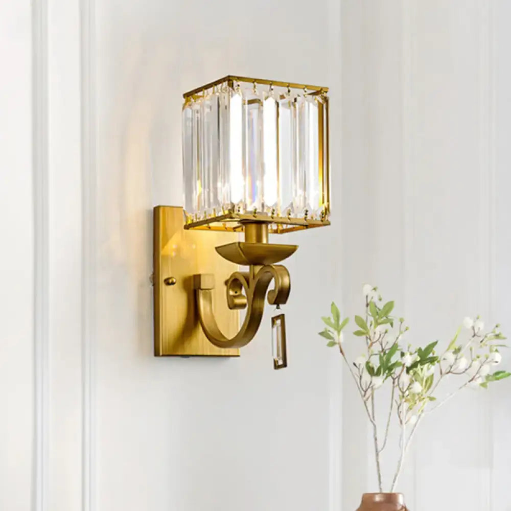 Gold-toned modern brass crystal block wall light with rectangular crystal cage vertical prisms e12 e14 inch fixture