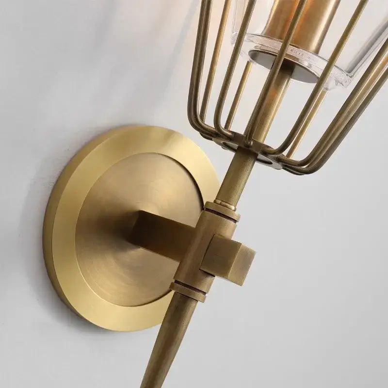 Brass-finished wall sconce with cage design and clear glass shade for modern decorbites crystal bronze pendant lamp use