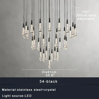 Modern brass crystal ceiling pendant light with black and clear crystal teardrop lights for dining room decorbites brass crystal