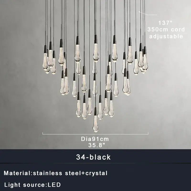 Modern brass crystal ceiling pendant light with black and clear crystal teardrop lights for dining room decorbites brass crystal