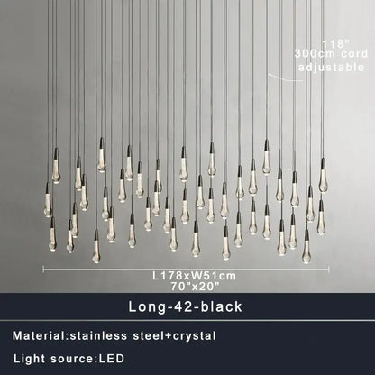 Modern brass crystal ceiling pendant light with black and clear crystal teardrop design and stainless steel accents by decorbites