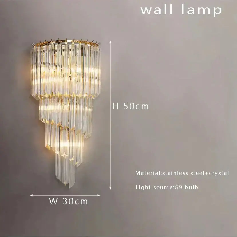 A modern brass crystal glass chandelier with gold-toned stainless steel frame and cascading decorbites crystal rods