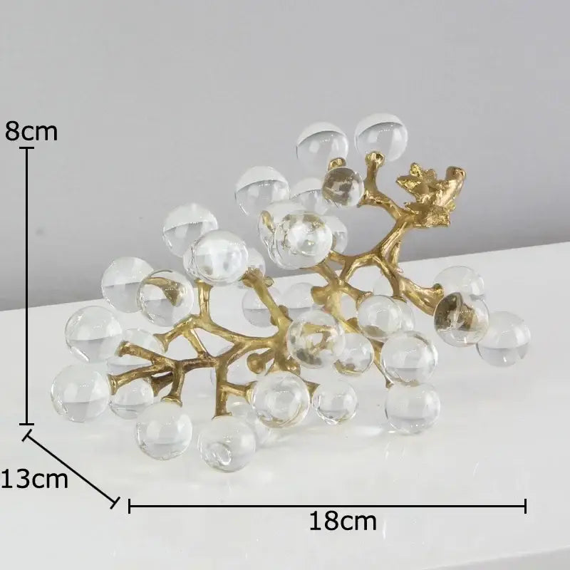 Modern brass crystal grape living room sculpture featuring gold-toned branch with clear faceted crystal grape ornaments
