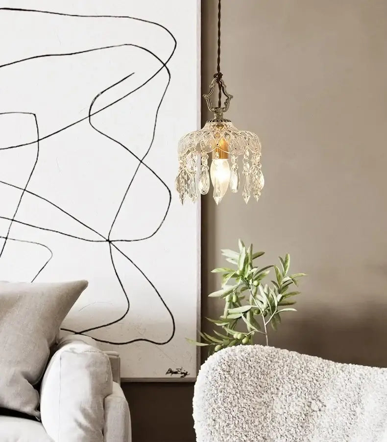 Modern brass crystal led ceiling light featuring an ornate vintage-style pendant with brass finish and crystal droplets