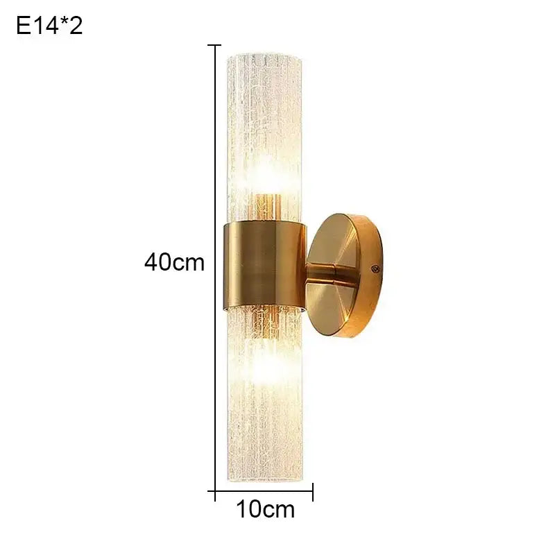 Modern brass crystal led wall lamp features a gold-toned wall sconce with frosted glass and brass mounting bracket