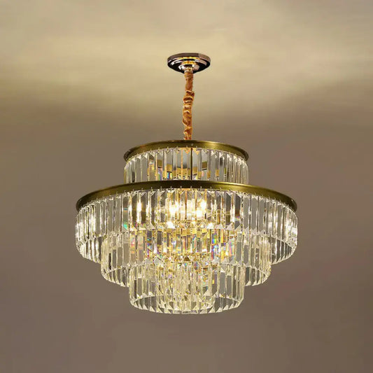 DecorBites™ modern crystal prism pendant light with brass finish and cascading clear glass prisms for living room