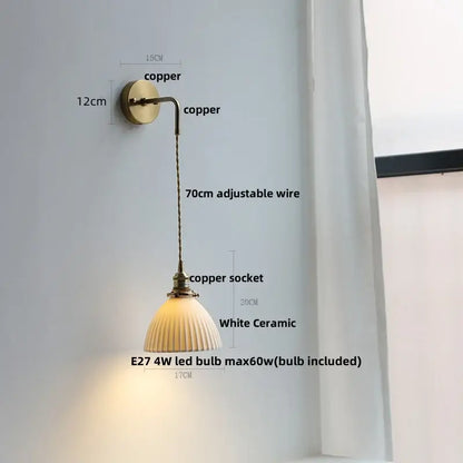 Modern brass crystal wall lamp with copper finish, white ceramic fluted shade, and adjustable wire for bathroom mirror decorbites clear glass
