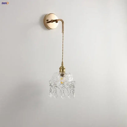 Modern brass wall lamp with clear glass chandelier shade and dangling crystals for bathroom mirror decorbites clear glass