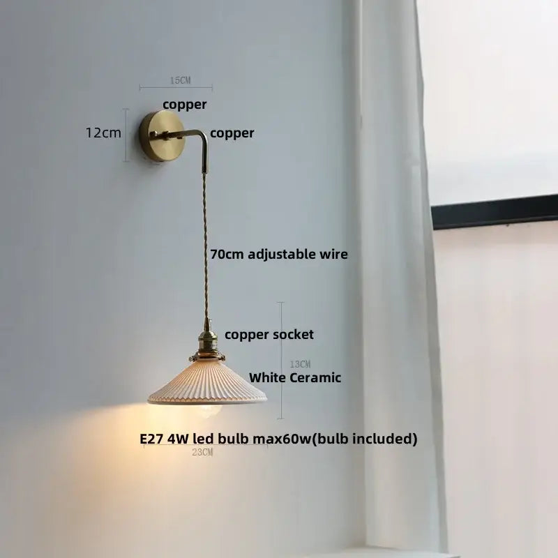 Modern brass crystal wall lamp with brass-finished copper bracket, adjustable wire, and white ceramic shade for decorbites clear glass use