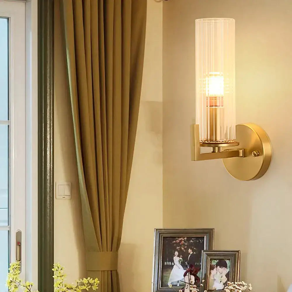 Modern brass crystal wall sconce with gold-toned fixture height and cylindrical frosted glass shade 220v-240v light type