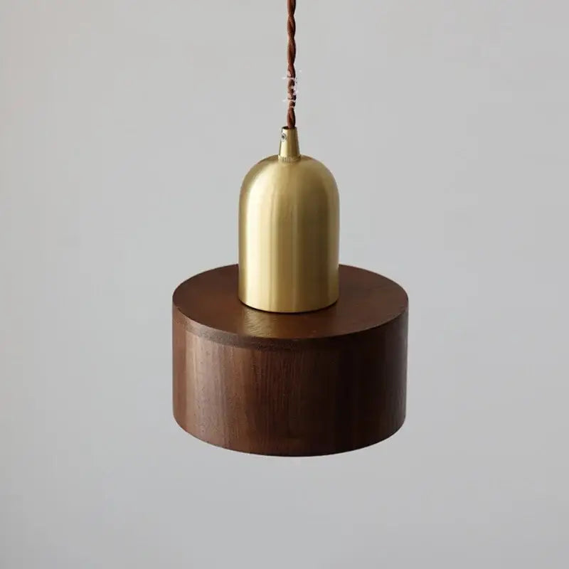 Modern brass and dark wood led wood pendant light with polished brass shade and twisted cord for dining room decorbites pendant light