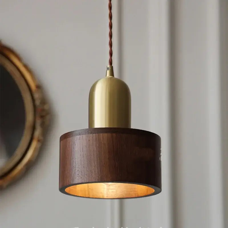 Modern brass and dark wood led wood pendant light with brass top and twisted cord for dining room decorbites led wood pendant