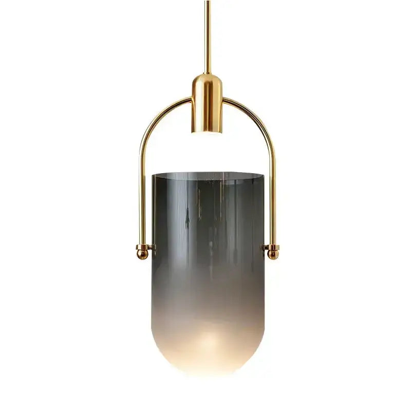 Modern brass decorbites bucket chandelier with a sleek gold metal frame and dark gray to translucent glass shade