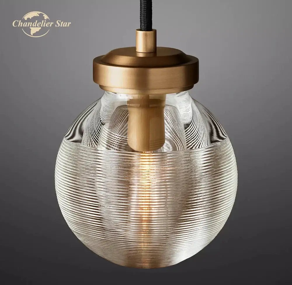 Modern brass decorbites crystal pearl pendant light with brass finish and textured ribbed glass shade for kitchen use