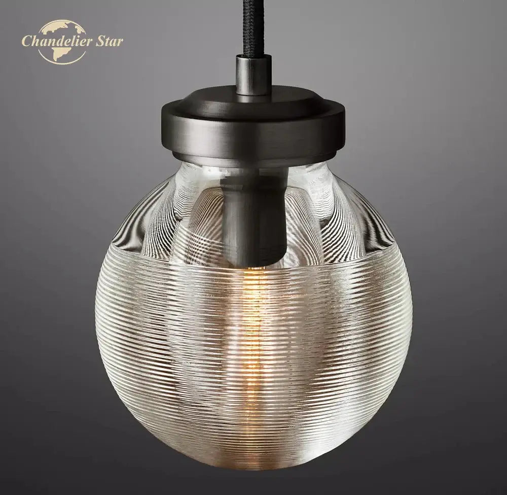 Modern brass decorbites crystal pearl pendant light with spherical clear glass and matte black metal fixture