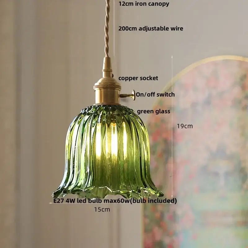 Modern brass decorbites cube amber pendant lamp with green fluted bell-shaped glass shade and brass accents for dining room