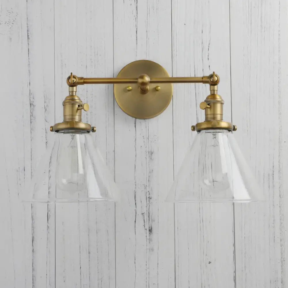 Modern brass decorbites funnel glass wall sconce with two clear glass conical shades wall-mounted light fixture