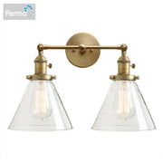 Modern brass decorbites funnel glass wall sconce with brass finish, two clear glass conical shades, and exposed filament bulbs