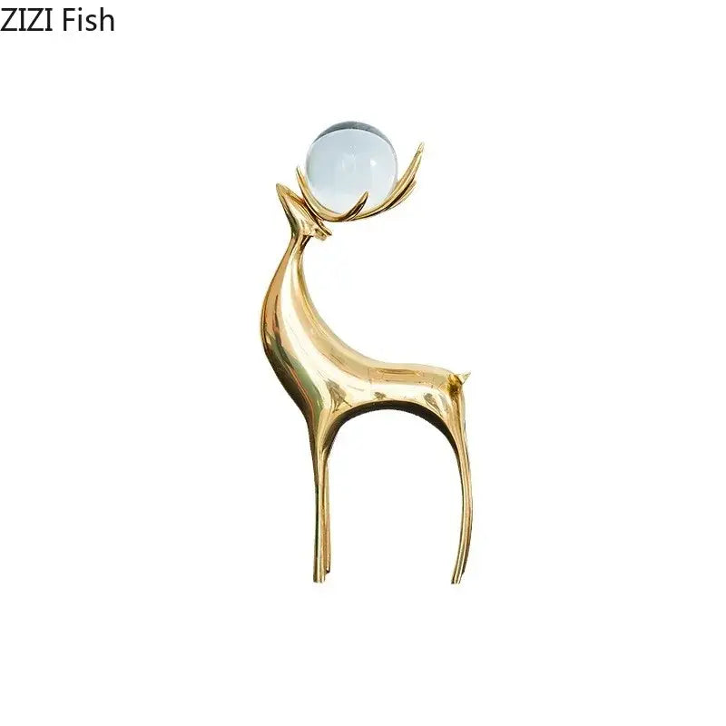 Modern brass deer statue desk ornament with polished golden finish and crystal sphere for living room decorbites brass deer