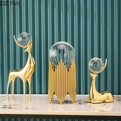 Modern brass deer statue desk ornament featuring golden brass deer with crystal glass orbs on antlers for living room decor