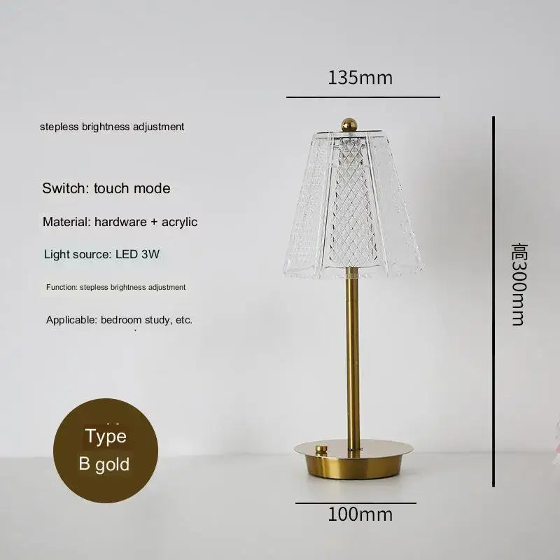 Modern brass diamond touch desk lamp with a gold finish, clear diamond-patterned acrylic shade, and sleek metallic base