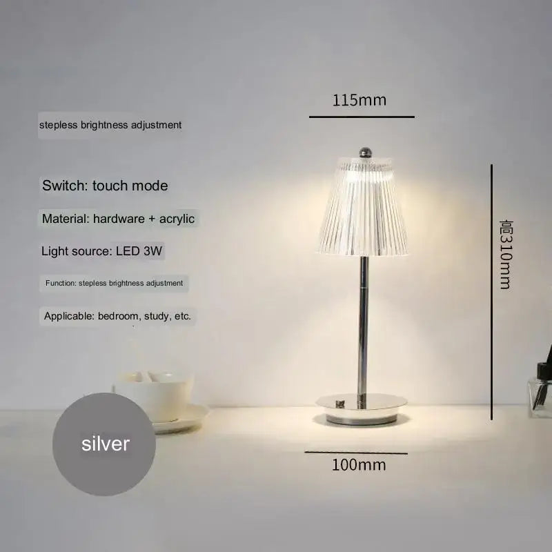 Silver touch desk lamp with sleek metallic base and translucent pleated acrylic shade for modern bedroom use