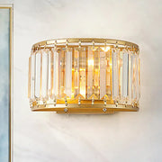 Modern brass drum shaped wall sconce with gold finish vertical crystal prisms and clear crystals for e12 e14 bulb use