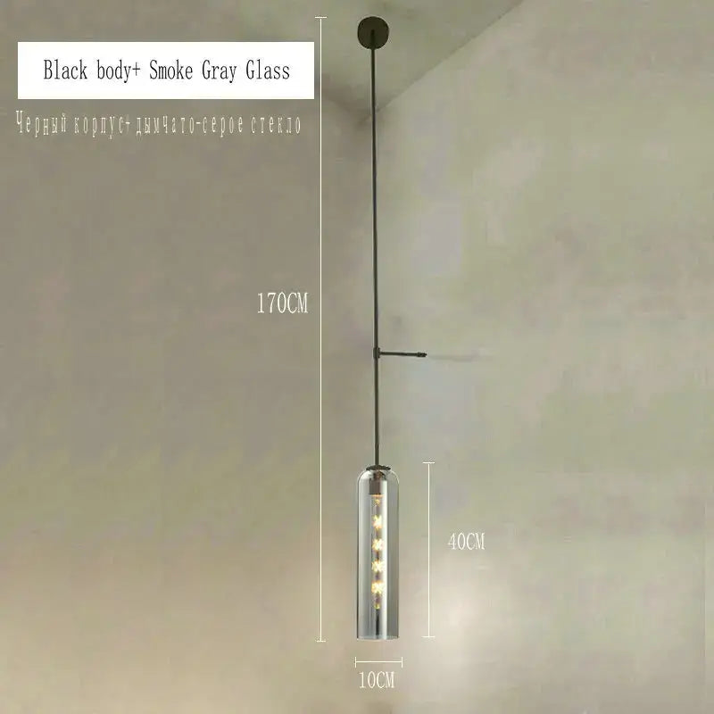 Modern brass e27 glass wall light with black pendant and smoke gray glass cylinder showcasing visible led bulbs