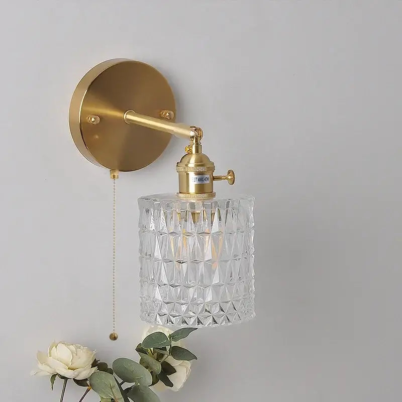 Modern brass e27 led wall sconce with gold-toned adjustable arm and faceted crystal glass shade for bedroom decorbites brass e27