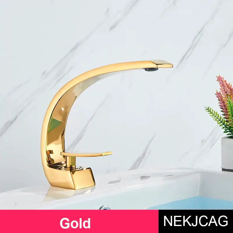 Modern brass faucet with gold finish and sleek curved design featuring a single handle for faucet hot cold use in bathroom vanity sink decorbites brass faucet