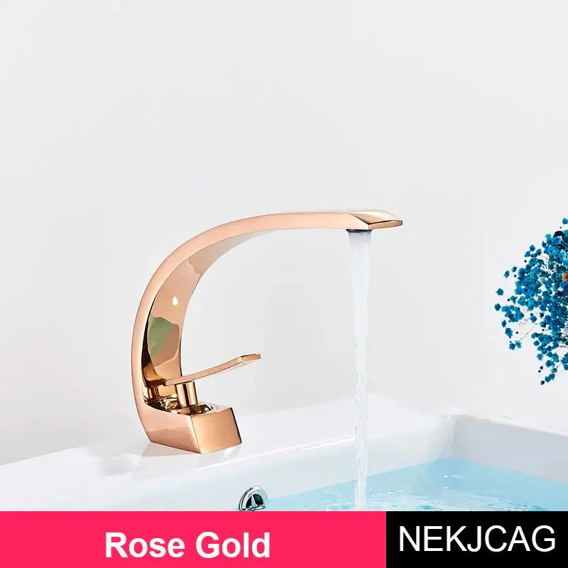 Rose gold brass faucet hot cold water mixer tap with sleek curved design and polished metallic finish for bathroom vanity sink
