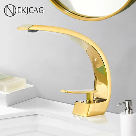 Modern brass faucet hot cold water mixer tap with sleek gold curved design and polished decorbites brass faucet finish