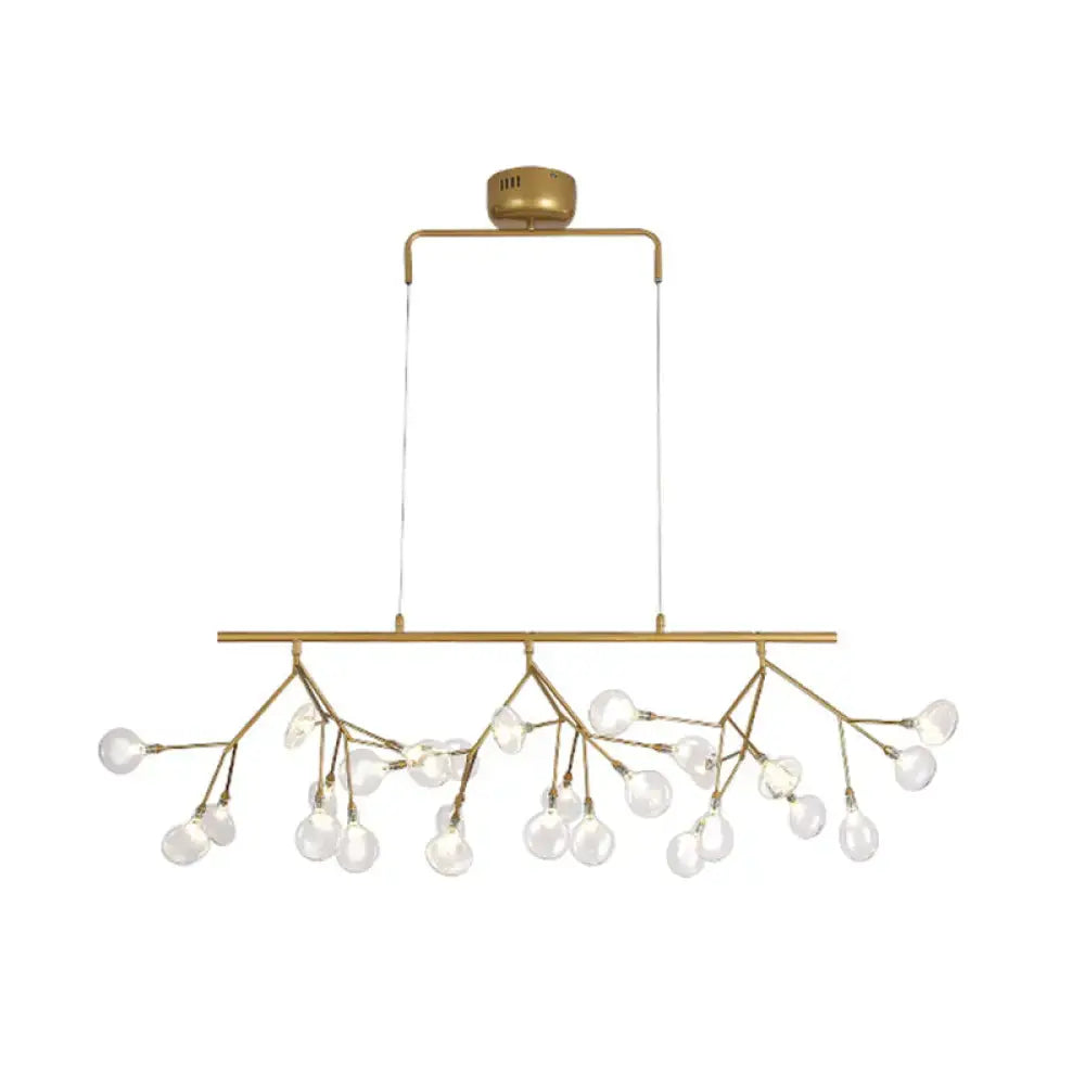 Gold-toned decorbites 27-bulb island light with brass finish, branching metal arms, clear glass globe bulbs, 220v-240v 110v-120v