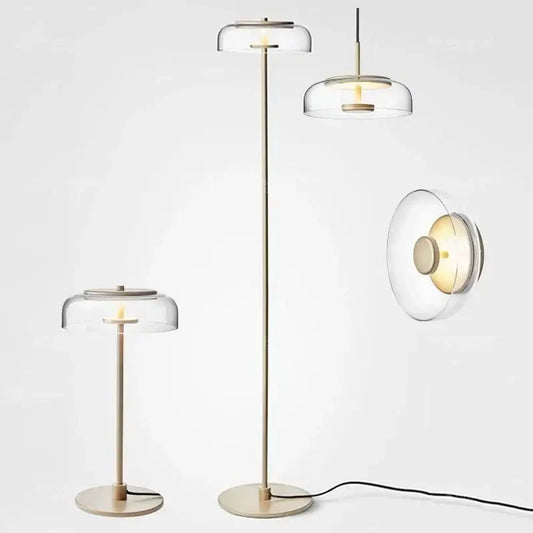 Modern brass floor lamp with clear glass lampshade featuring decorbites circular glass design for living room decor