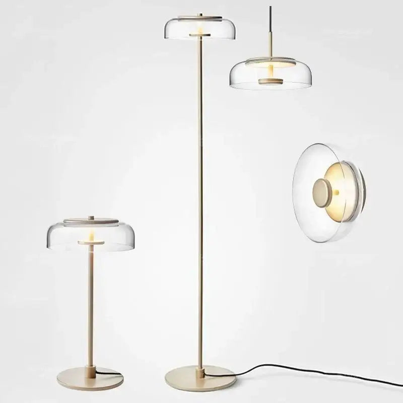 Modern brass floor lamp with clear glass lampshade featuring decorbites circular glass design for living room decor