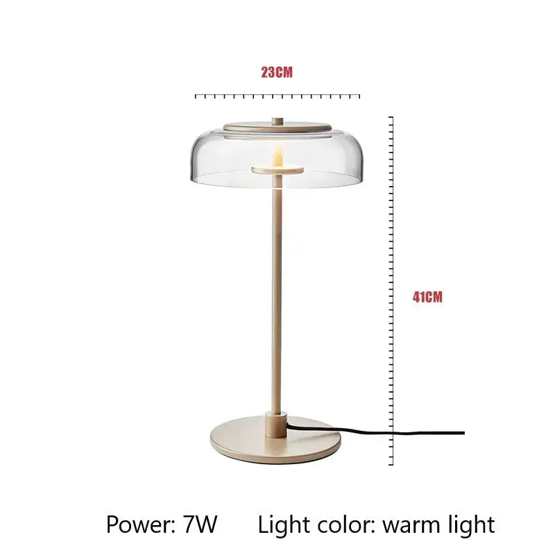 Modern brass floor lamp with beige metal base and clear glass lampshade by decorbites circular glass for living room decor